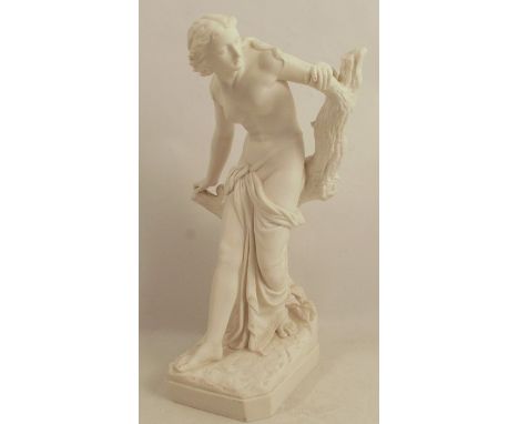 A 19th century Royal Worcester parian figure, The Bather Surprised, unmarked, having impressed "W" to the base, and with dama