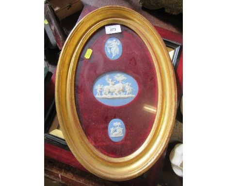 3 Wedgwood porcelain plaques, decorated with classical figures to a blue ground, framed as one, maximum diameters 2.5ins, 4.2