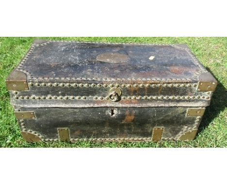 A leather covered trunk having brass corners, studs and handles, the plaque engraved, Lieutenant Josh Graham, 2nd Battalion 2