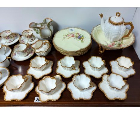 A set of six Royal Worcester floral decorated dessert plates, 8½” diam; a similar bowl, 9” diam.; a late Victorian china nine