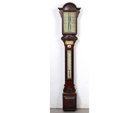 A late 19th century stick barometer, bears name “Mattocks Optician”, in carved oak case, 40½” high.