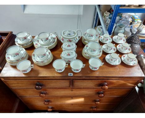 A Wedgwood bone china fifty-seven piece extensive part tea service; &amp; a ditto set of six coffee cans &amp; saucers.