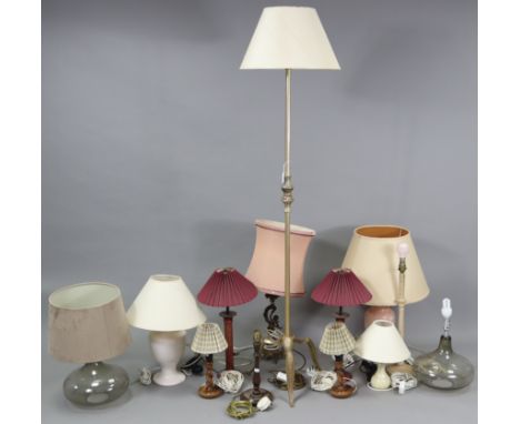 A brass standard lamp on triform base, with shade; &amp; twelve various table lamp bases.