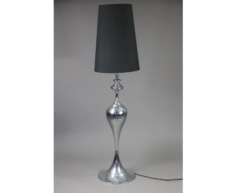 A chrome-plated standard lamp with ovoid-shaped centre column, &amp; on round pedestal foot, with shade, 62½” high.