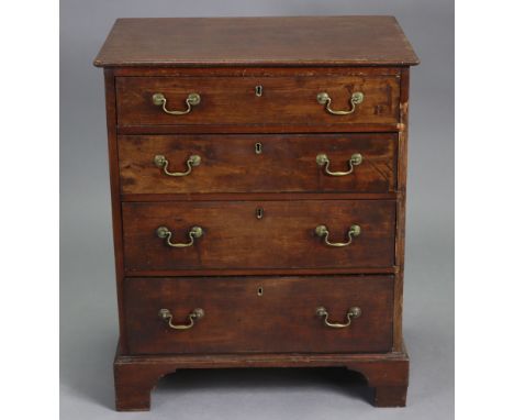 A Georgian-style small chest of four long graduated drawers with brass swan-neck handles, on bracket feet; 25¼” wide x 30¾” h