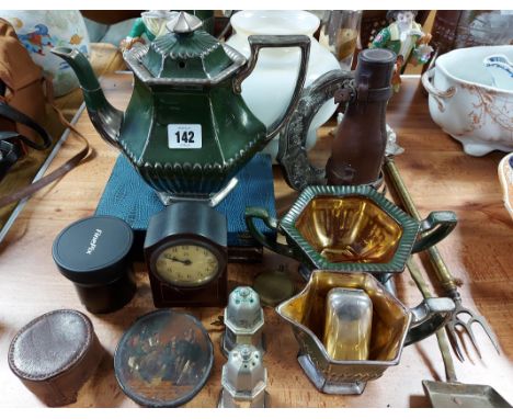 A green glazed pottery four-piece tea &amp; coffee service; a pair of continental porcelain male &amp; female figures; a swin