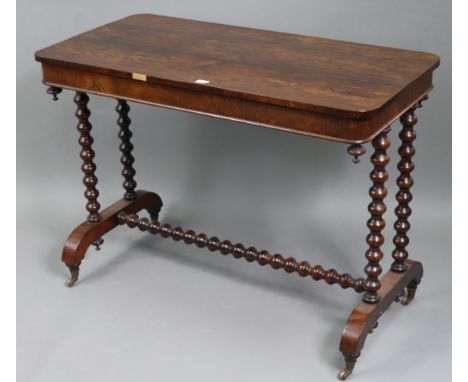 A 19th century rosewood centre table with rounded corners to the rectangular top, &amp; on a pair of bobbin-turned supports t