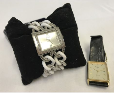 A ladies Guess watch with silver tone & white chain bracelet. Together with a Pulsar watch with champagne dial and black leat
