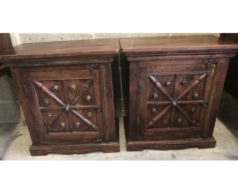 A pair of rubber wood cabinets with starburst design to door fronts. Each has an internal shelf. Approx. 54cm x 57cm.