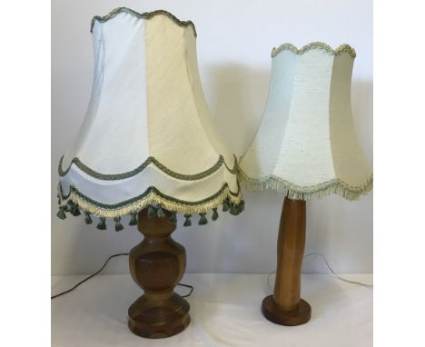 2 vintage wooden based table lamps with light shades.  Largest approx. 34cm tall (with out fittings and shade).