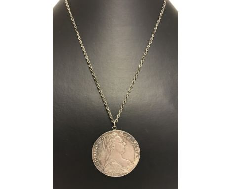 A 1780 Maria Teresa crown mounted on 835 silver chain.  