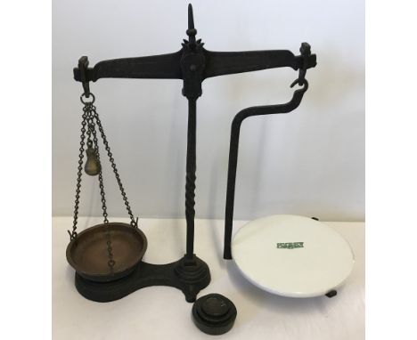 A set of vintage brass Avery weighing scales. Complete with weights and ceramic weighing platform. 