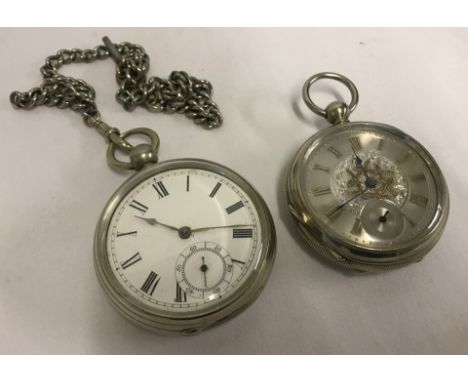 2 vintage half hunter pocket watches. A Waltham with chain and key, in need of restoration together with another marked W. Lo