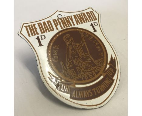 Circa 1960's Enamel "Bad Penny Award" badge. Made by Dodo design. Approx. 12 x 10cm.