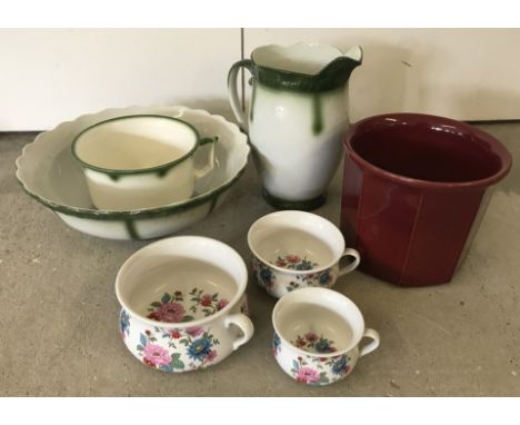 A quantity of large ceramic items. Comprising a vintage green and white part bathroom set, a maroon octagonal planter and a s