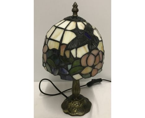 A small Tiffany style table lamp.  Approx. 30cm tall.