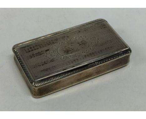 A good Georgian hinged top silver snuff box with engine turned decoration. Apparently unmarked. Approx. 35 grams. Est. £80 - 