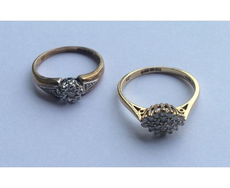 A modern 9 carat diamond cluster ring together with one other. Approx. 4.6 grams. Est. £50 - £80.