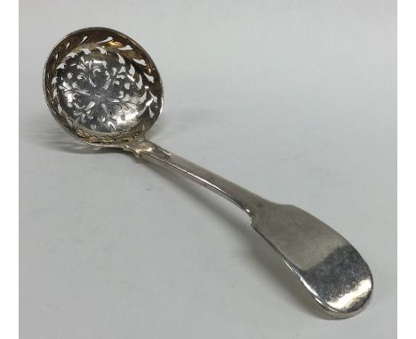 A heavy silver fiddle pattern sauce ladle. London. By HE. Approx. 59 grams. Est. £30 - £40.