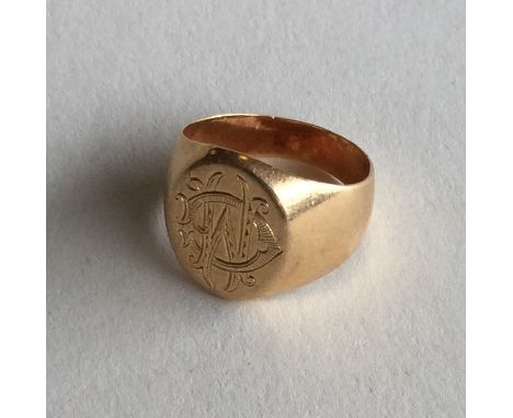 A Continental 18 carat gold oval signet ring. Approx. 7.8 grams. Est. £150 - £200.