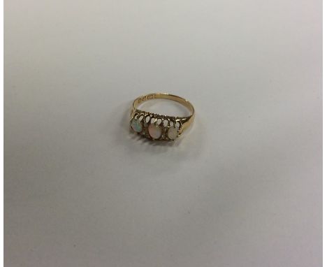 A Victorian opal and diamond seven stone ring set in 18 carat gold. Approx. 2.1 grams. Est. £40 - £60.