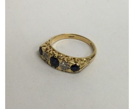A good quality 18 carat sapphire and diamond half hoop ring. Approx. 5.2 grams. Est. £100 - £150.