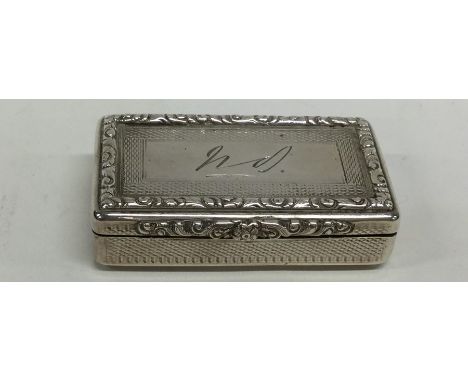 A heavy Georgian silver rectangular snuff box with gilt interior. Birmingham. By ES. Approx. 84 grams. Est. £100 - £150.