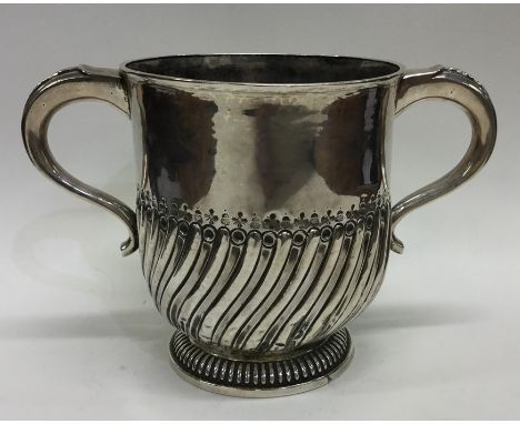 NEWCASTLE: A good quality half fluted two handled porringer on step base. By JC. Approx. 413 grams. Est. £500 - £800.