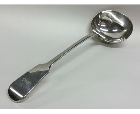 A heavy silver fiddle pattern soup ladle. London. By JW. Approx. 246 grams. Est. £120 - £150.