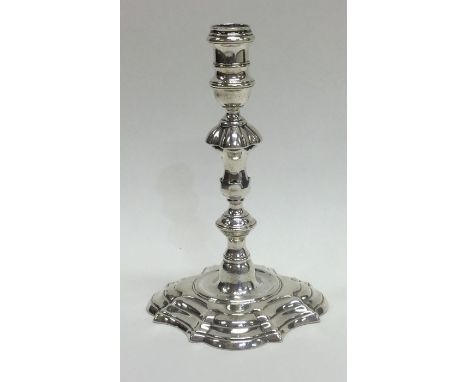 A Georgian silver taper stick of typical form. London 1774. Approx. 118 grams. Est. £450 - £550.