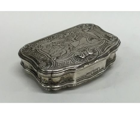 An unusual German silver snuff box attractively decorated with figures and scrolls to gilt interior. Approx. 87 grams. Est. £