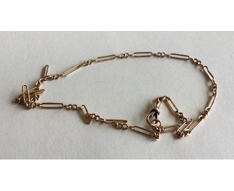 A 9 carat long and short link chain with ring clasp. Approx. 7.7 grams. Est. £80 - £120.