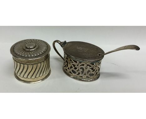 A small silver half fluted caddy together with a silver drum mustard and spoon. Various dates and makers. Approx. 184 grams. 
