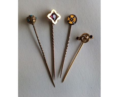 A good group of Victorian gold stick pins set with semi-precious stones. Approx. 7.1 grams. Est. £80 - £120.