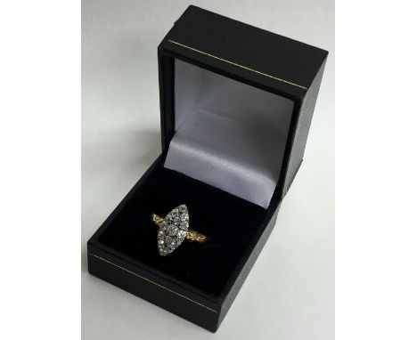 A Victorian diamond marquise shaped ring in 18 carat gold setting. Approx. 4 grams. Est. £600 - £700.