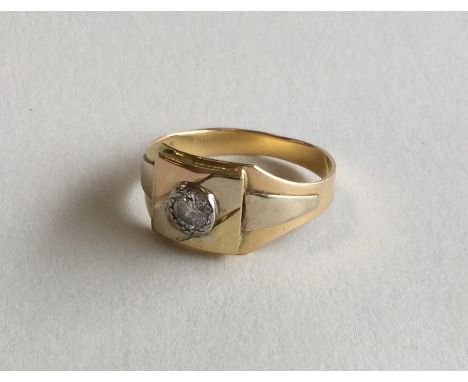 An 18 carat diamond single stone gypsy set ring in rubover mount. Approx. 6.4 grams. Est. £100 - £150.