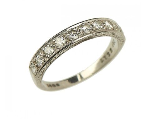 A DIAMOND HALF ETERNITY RING  in 18ct white gold, London 1965, 4.2g, size Q½ ++Light signs of wear