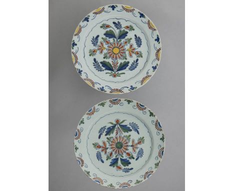 TWO ENGLISH DELFTWARE DISHES, BRISTOL, C1760 one painted in the blue, red and green palette, the other with the addition of y