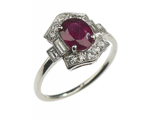 A RUBY AND DIAMOND CLUSTER RING  millegrain set with baguette diamonds to the shoulders, in platinum, 3.9g, size M½++In good 