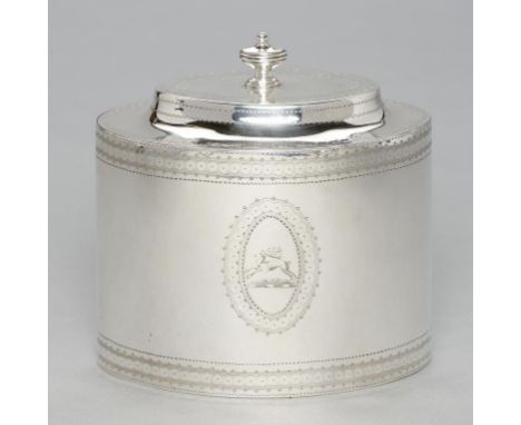 A GEORGE III OVAL SILVER TEA CADDY   the cavetto lid with integral hinge, engraved with armorials in guilloche border, the lo