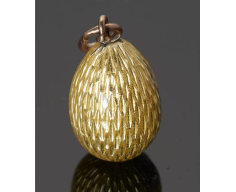 FABERGE.  A RUSSIAN GOLD AND GUILLOCHE ENAMEL EASTER EGG PENDANT, C1900 20mm including loop, partial maker's mark on loop A- 