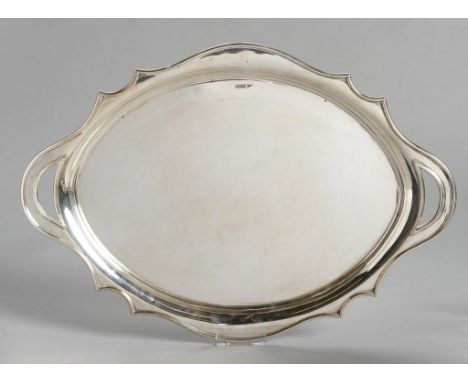 A GEORGE V SILVER TEA TRAY with pierced handles, 65cm w, by Walker & Hall, Sheffield 1912, 102 ozs++The back engraved with a 