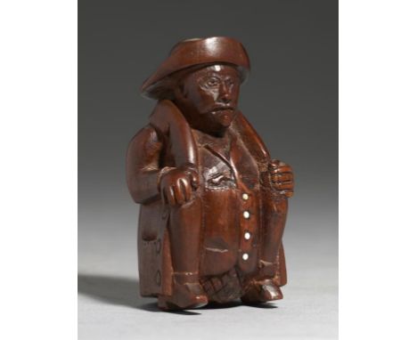 TREEN.  A CARVED WOOD SNUFF  BOX IN THE FORM OF  A SEATED MAN, GERMAN OR DUTCH, EARLY 19TH C  9cm h++In good condition