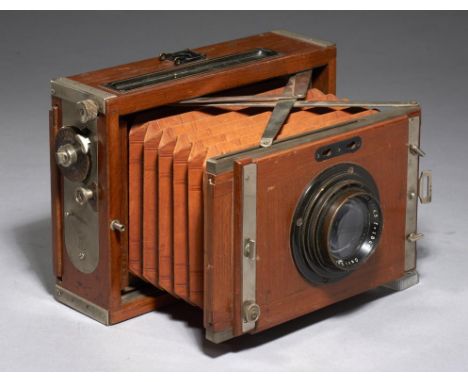 A CONTESSA-NETTEL TROPICAL FOLDING PLATE CAMERA, NO. AS6659 C1919-26  for 9 x 12cm plates,  with nickel plated mounts, fine l