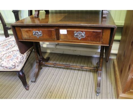 A REPRODUCTION MAHOGANY FINISHED COFFEE TABLE SIZED SOFA TABLE of typical form and construction 