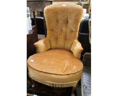 A 20TH CENTURY OLD GOLD COURDEROY UPHOLSTERED BUTTON BACKED DEEP SEATED ARMCHAIR 