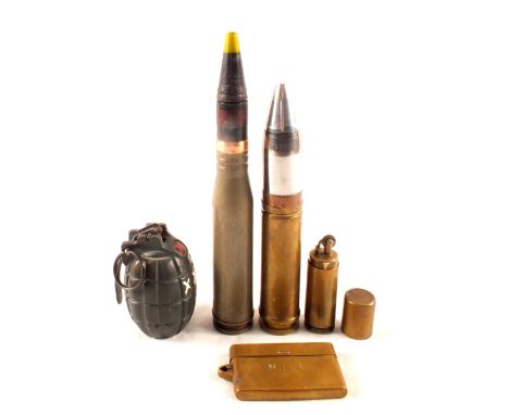 A mixed lot including 30mm inert shells, 'Trench Art' and a practice grenade