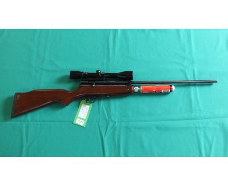 A S.M.K. XS79 bolt action C02 air rifle with A.S.I. 4x40 scope and six spare unused C02 capsules, as a post 1939 air weapon t