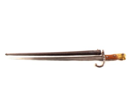 A French model 1874 bayonet with scabbard, blade maker marked and dated 1879