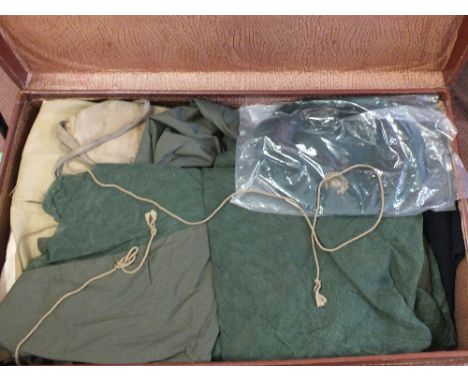A mixed lot of mainly Royal Naval and 'Marine' uniforms etc within a vintage case
